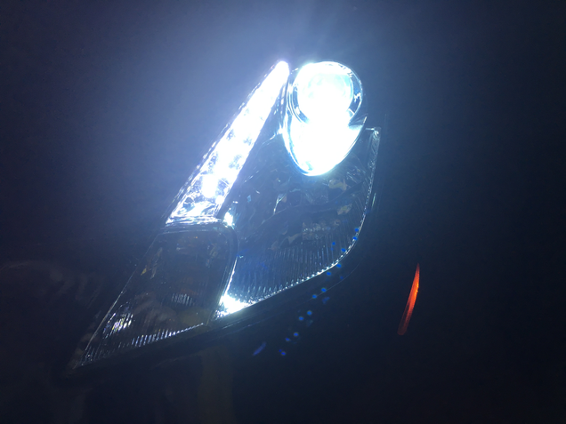 Close-up of the headlights at night